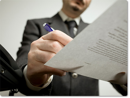 Man signing document